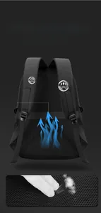 Detail of breathable honeycomb mesh back and luggage strap on black business backpack