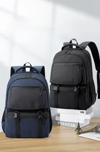 Detail view of waterproof nylon business backpacks in black and navy with buckle closures