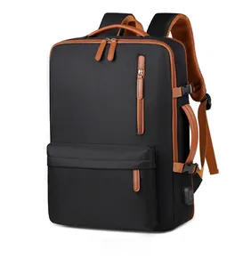 Detail view of business backpack featuring built-in USB charging port and side zipper pocket