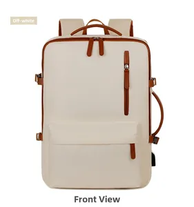 Front view of cream white business backpack with brown leather trim and zipper pockets