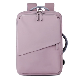 Pink waterproof laptop backpack with large capacity and external USB charging port