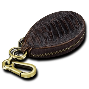 Vintage dark brown embossed leather car key case with retro gold hardware and zipper