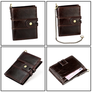 Macro detail of dark brown leather wallet showing vintage chain and RFID card slots