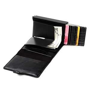 Detail of black leather RFID wallet showing bills compartment and pop-up card slots