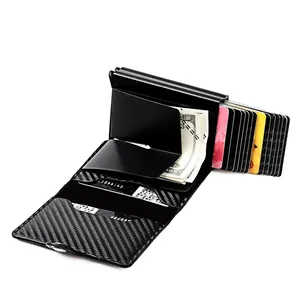 Detail view of carbon fiber RFID wallet interior with metal money clip and card slots