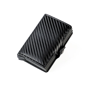 Detail of minimalist RFID blocking carbon fiber wallet showing metal frame and buckle