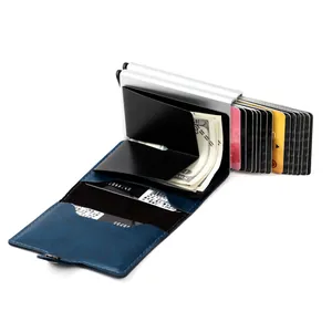 Detail of blue leather RFID wallet with dual aluminum card slots and pop-up slider