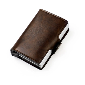 Detail of slim brown leather RFID wallet with pop-up aluminum card holder mechanism