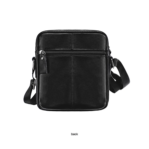 Detailed back view of a black leather chest bag featuring a zippered hidden pocket