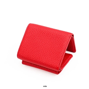 Side view detail of red pebbled genuine leather tri-fold wallet with RFID protection