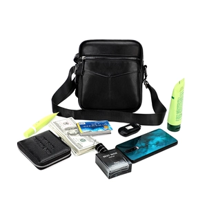 Men's black pebble leather crossbody chest bag with adjustable strap and daily essentials