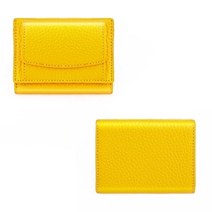 Detail of bright yellow litchi grain leather wallet with fine hand-stitched edges