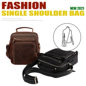 Detail of vintage crazy horse leather crossbody bag with multiple anti-theft zipper pockets