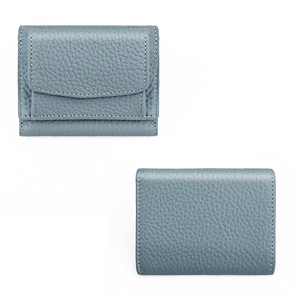 Detail view of fog blue pebble grain leather tri-fold wallet with contrast stitching