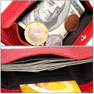Detail of red pebbled leather wallet featuring RFID card slots and zippered coin pocket