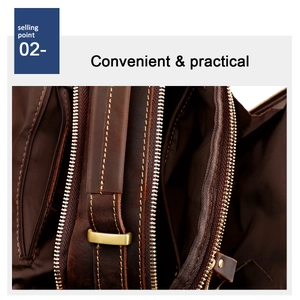 Detail of dark brown leather bag with multi-zipper compartments and brass hardware