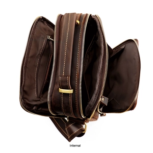 Internal view showing three large zipper compartments of vintage brown crazy horse leather bag