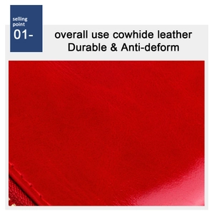Detail of red cowhide leather coin purse showing durable texture and natural grain
