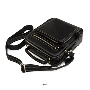 Side view of retro crazy horse leather crossbody bag with multiple zip pockets