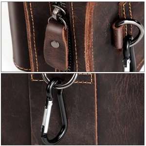 Dettaglio borsa in pelle crazy horse vintage con cuciture pesanti e fibbie metalliche