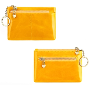 Front and back detail of yellow leather coin purse with heart charms and key ring