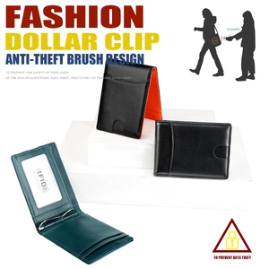 Detail view of RFID blocking slim wallet with orange lining and stainless money clip