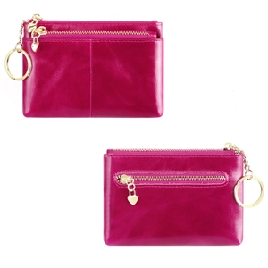 Detailed view of rose red oil wax leather coin purse with gold heart charm and key ring