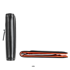 Slim minimalist wallet with black leather and orange lining featuring metallic zipper detail