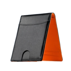 Slim bifold wallet with black leather exterior and orange interior featuring a card push slot