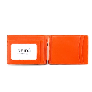 Detail of bright orange bifold slim wallet showing metal money clip and RFID ID window