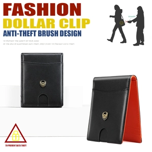 Detail of slim men's wallet featuring black leather exterior and orange RFID-blocking lining