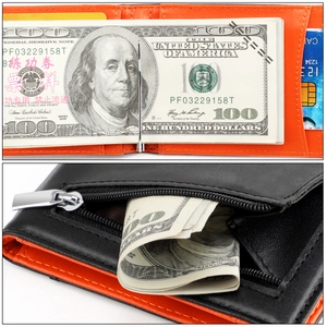 Detail of slim bifold wallet showing orange interior, money clip, and side zipper pocket