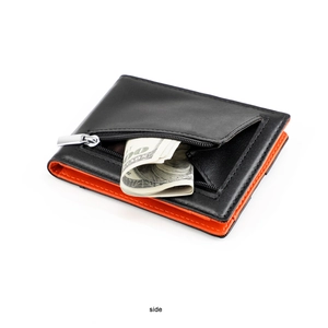 Side view of slim bifold leather wallet showing orange lining and metal money clip