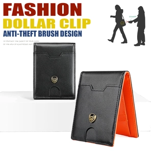 Detail of RFID blocking leather wallet with orange lining and secure metal dollar clip