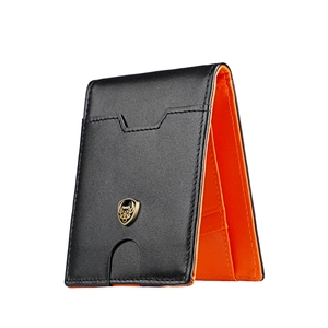 Detail of slim leather wallet with black pebble grain and orange card slots