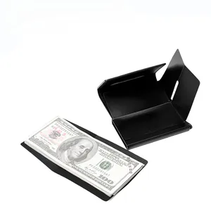 Slim aluminum card holder showing internal slots and money clip with dollar bills