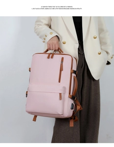 Pink business laptop backpack with USB port and brown leather details for daily travel