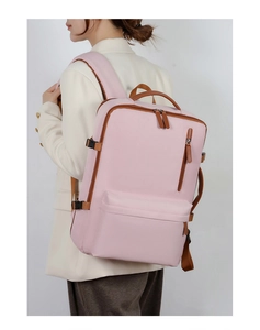 Pink waterproof Oxford fabric business backpack with leather details shown on model