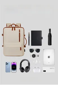 Beige business backpack with USB port showing spacious storage for laptops and gadgets