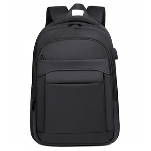 Business laptop backpack in matte black with USB charging port and breathable straps