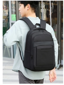 Close-up of black business laptop backpack with ergonomic breathable mesh shoulder straps