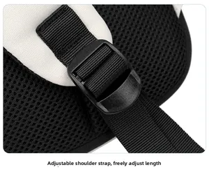 Detail of adjustable shoulder strap with plastic buckle and breathable mesh on black backpack