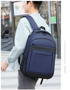 Detail of navy blue business backpack with padded breathable straps and oxford fabric