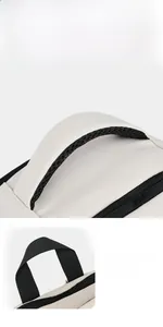 Detail of the thickened mesh handle and nylon strap on the expandable backpack