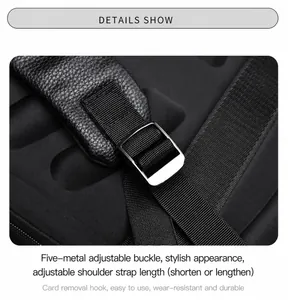 Close-up of silver metal adjustment buckle and lychee leather strap on a black backpack