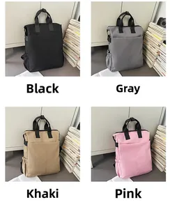 Collage de quatre sacs à dos grande capacité en noir, gris, kaki et rose pâle