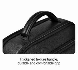Close-up of the reinforced thickened top handle on the black leather business backpack