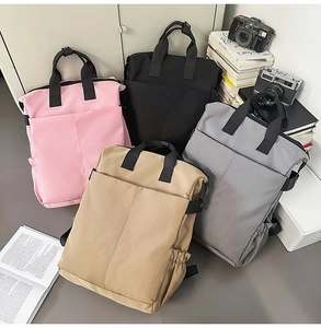 Vue à plat de sacs à dos grande capacité en rose, noir, kaki et gris avec poche frontale