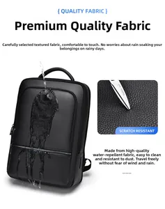 Detail of waterproof black leather business backpack showing scratch-resistant fabric