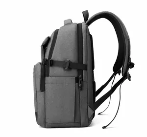 Vista laterale dello zaino business grigio scuro con spallacci ergonomici in rete